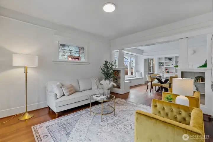 Light filled living room flows into dining room