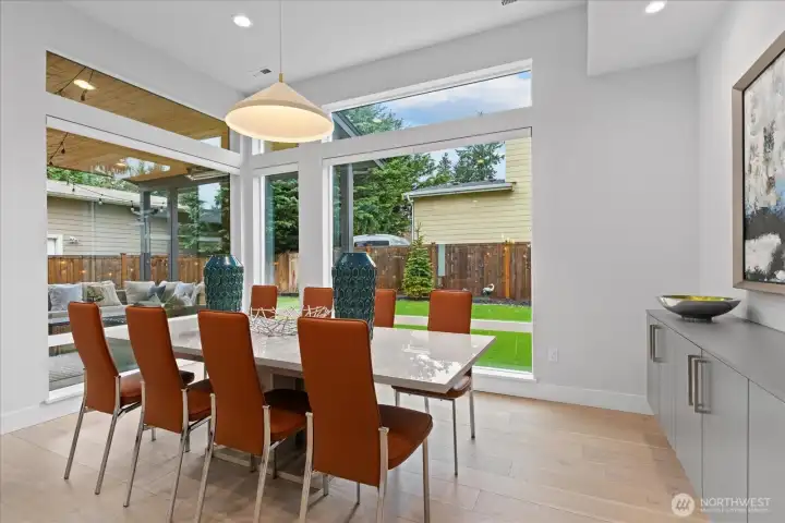 Bathed in natural light and framed by serene outdoor views, the dining space turns every meal into an experience.