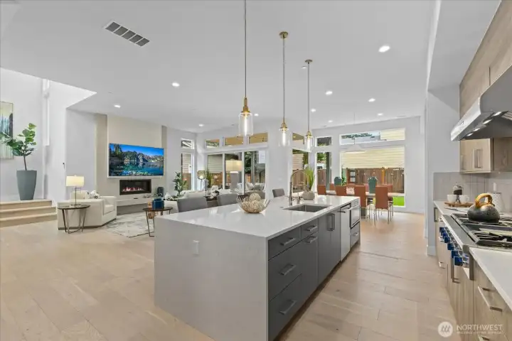 Designed as the true heart of the home, this chef’s kitchen opens seamlessly to the great room and dining space—perfect for everyday living, entertaining, and everything in between.