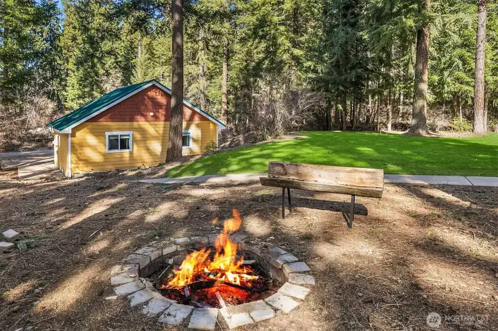 Outdoor firepit for roasting hot dogs and marshmallows all summer long...