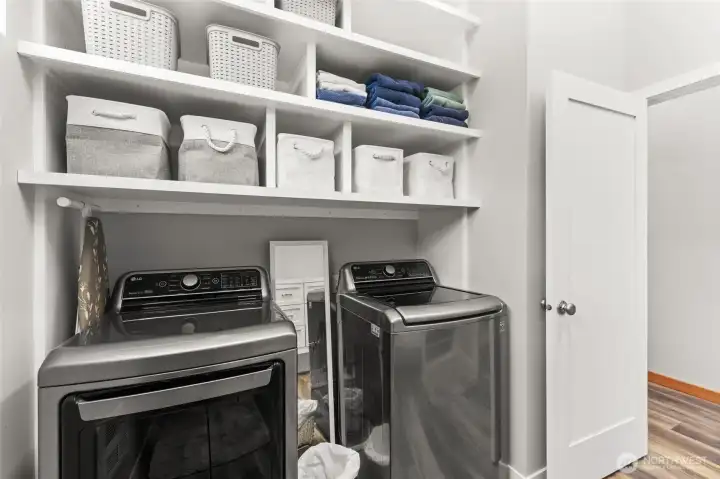 Laundry room with tons of storage space. Laundry room with tons of storage space.