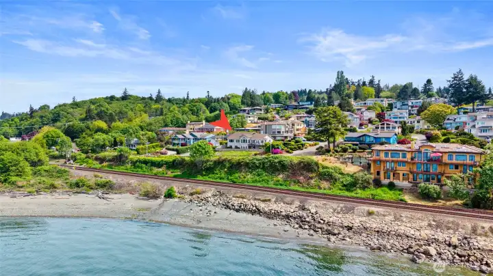 Unobstructed views from this prime location, just across the street from private community beach.