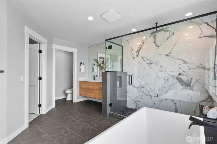 Adjoining walk-in closet off primary en-suite.