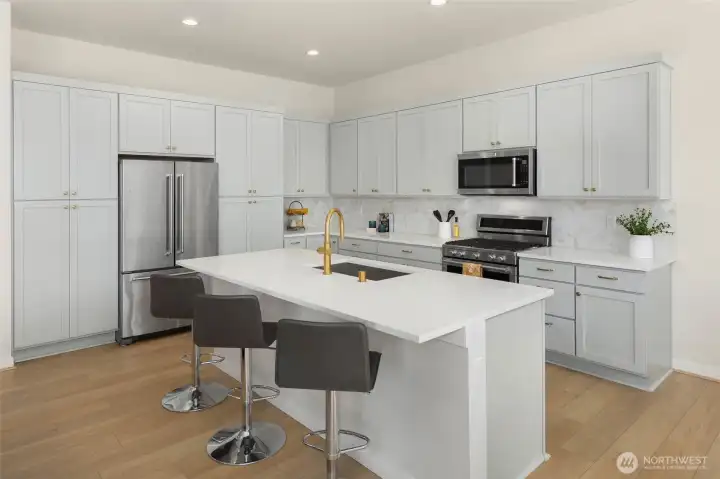 If you like to cook, this kitchen will not disappoint! Abundant cabinets and countertop space for all of your cooking needs.