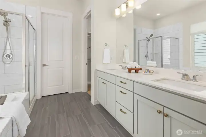 A beautiful spa-like bathroom invites relaxation and a space to call your own.