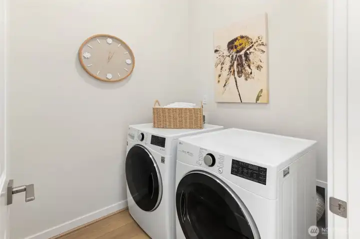 The laundry room is centrally located on the main level with easy access from all of the rooms.