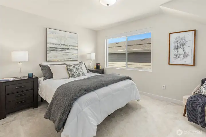 This third bedroom is located upstairs next to the loft.