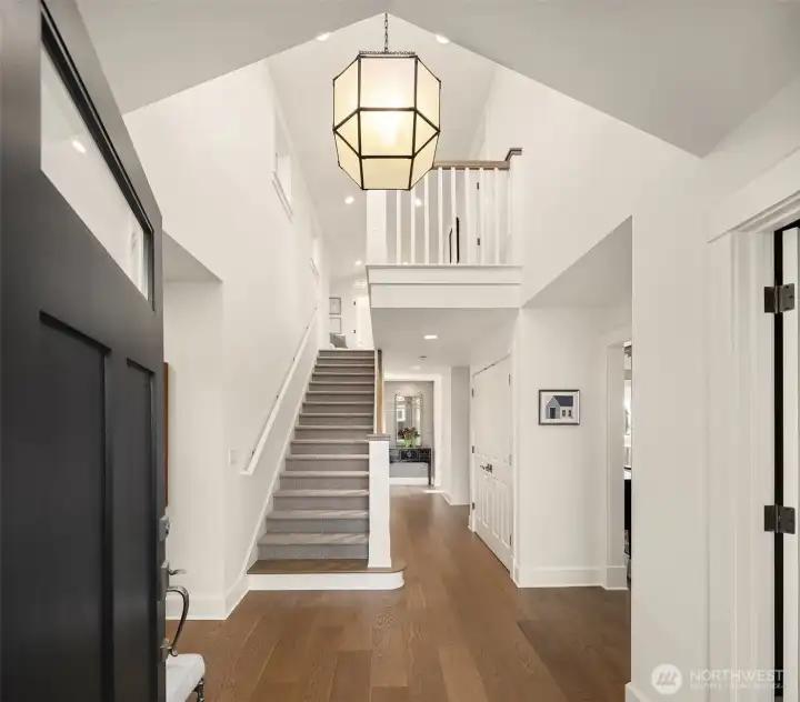 A two story entry with great volume greets you. luxury lighting from Urban Electric, Mitiz,Amber Lewis, RH define the spaces with style. A two story entry with great volume greets you. luxury lighting from Urban Electric, Mitiz,Amber Lewis, RH define the spaces with style.