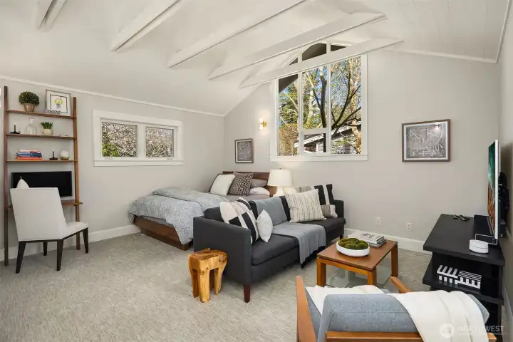 This main floor bedroom is really a retreat- easy to use as a second primary. This main floor bedroom is really a retreat- easy to use as a second primary.