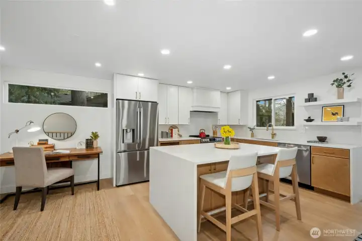 Completely redesigned kitchen provides tons of space to gather. Completely redesigned kitchen provides tons of space to gather.
