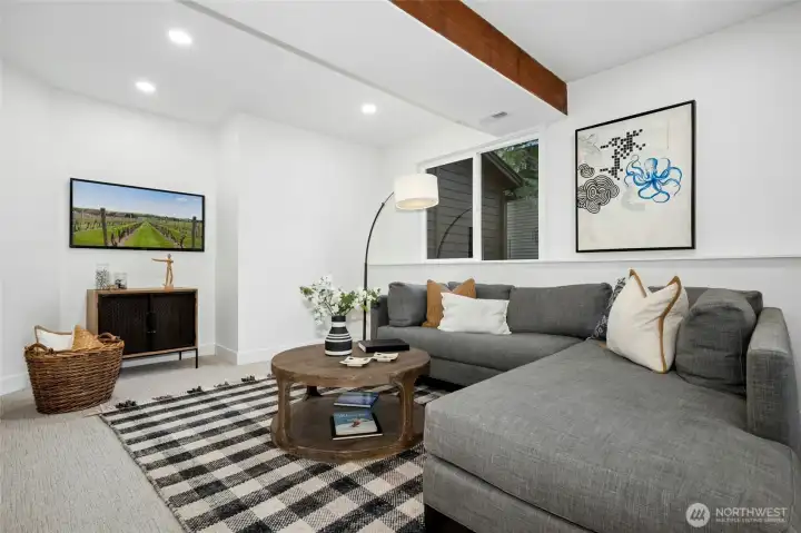 Big rec room downstairs, a fun gathering spot with sliding doors leading to the massive lower level deck. Big rec room downstairs, a fun gathering spot with sliding doors leading to the massive lower level deck.