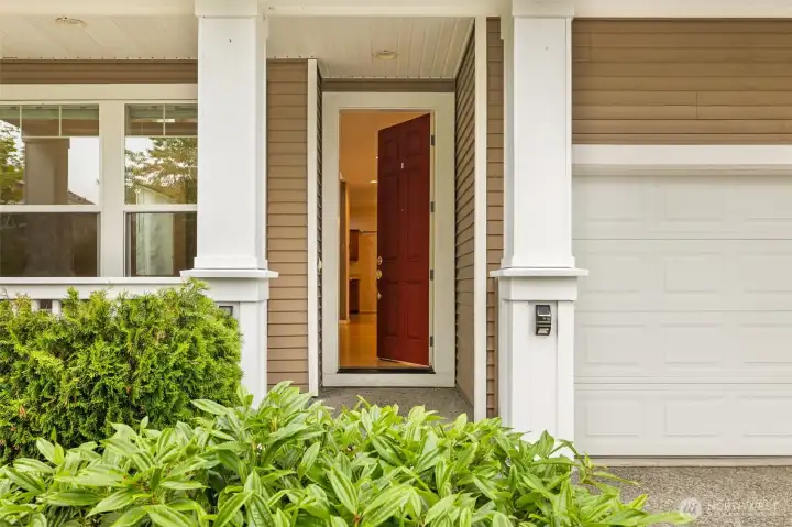 Covered entry with classic Craftsman columns and detailing. Covered entry with classic Craftsman columns and detailing.