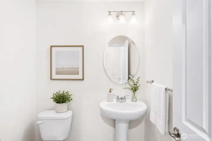 Half bathroom on the main level. Half bathroom on the main level.