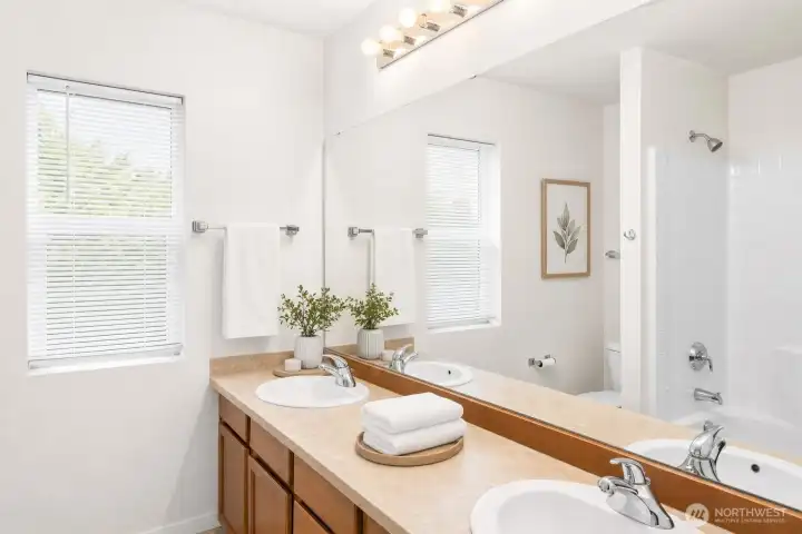 Full bathroom shared by the upstairs secondary bedrooms. Full bathroom shared by the upstairs secondary bedrooms.