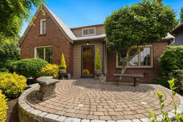 This lovely 1920’s brick Tudor is one that is not to be missed!