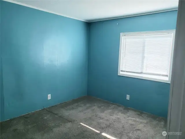 Good Size Second Bedroom with Newer Carpeting.