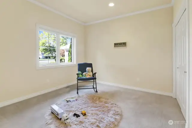 Another large bedroom overlooks the front yard.