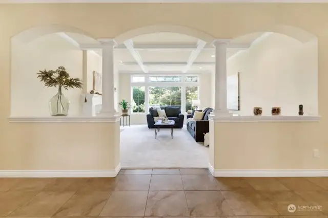 Living Room: With arched openings and pillars defining the space, get ready for stylish entertaining!