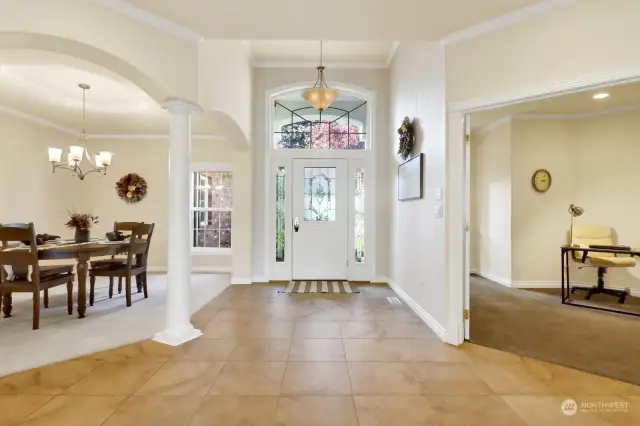 Foyer: Prepare to be impressed! To the left of the entrance is an elegant formal dining room, while to the right, a stylish home office immediately catches the eye.