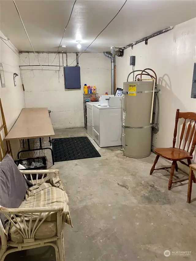 Coin op Washer/Dryer in the basement with room for more storage or another set of W/D.