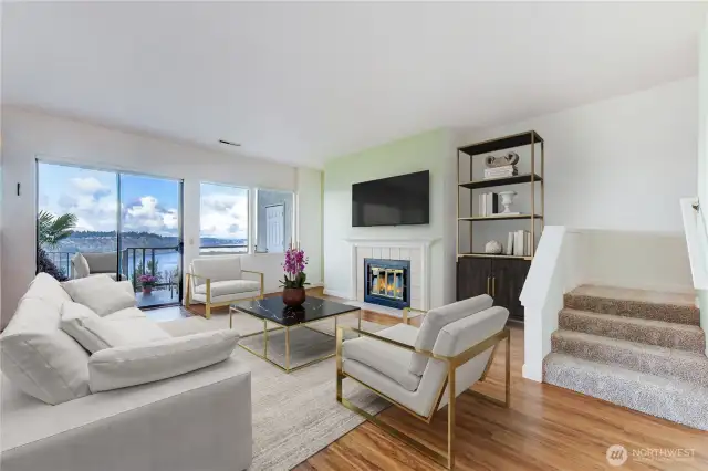 High ceilings offer lots of space for art, photos & collections.  A wall of windows beckons you to watch ever-changing scenes on the water and in the air.