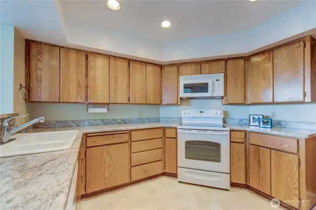 Recessed lighting brightens all work areas.  Doing the dishes takes on a new meaning as you gaze across the waters of Puget Sound!