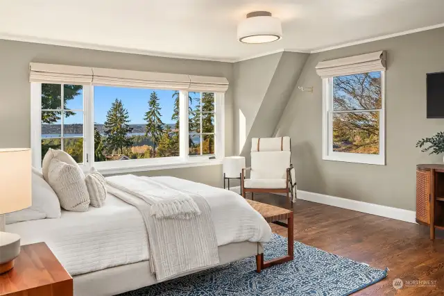 Upstairs, the primary suite is a retreat with spa-like amenities, a large picture window for breathtaking PNW sunsets.  Not shown is an oversized walk-in closet