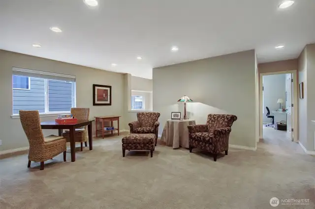 View of loft space from the primary bedroom.