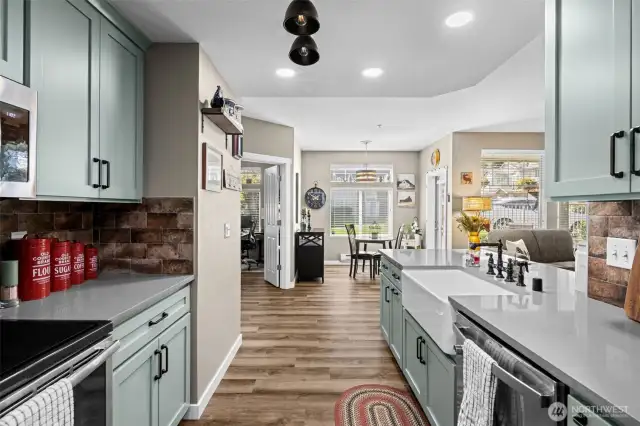 Direct access from the attached garage makes unloading groceries a breeze—no long hallways or shared entries here, just straight into your beautiful kitchen.
