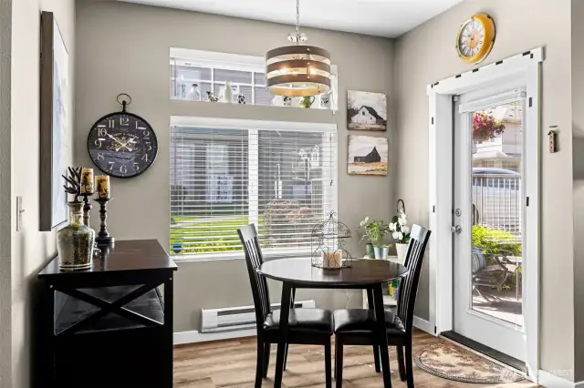 Bright and functional dining area with natural light and direct access to the patio—perfect for quick bites or weekend takeout.