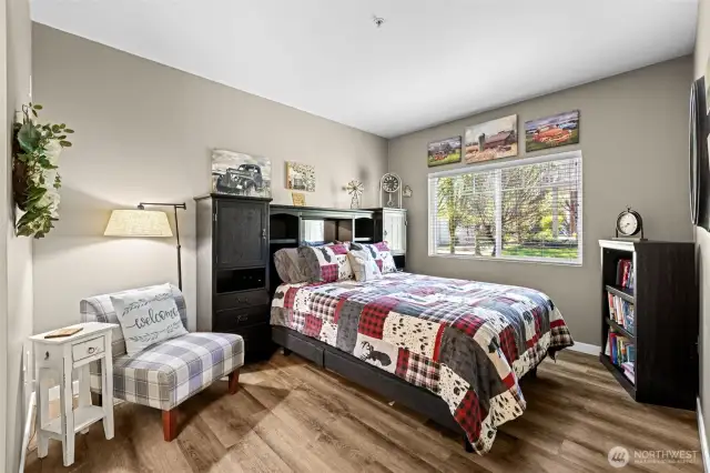 Tucked away for privacy, the primary suite offers peaceful views, great natural light, and plenty of room to unwind and recharge.