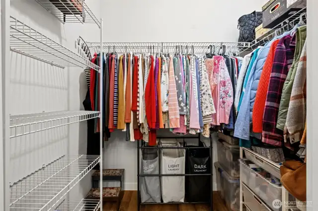The large walk-in closet in the primary bedroom offers plenty of space to stay organized—with room for all the shoes, seasonal bins, and your favorite fits.