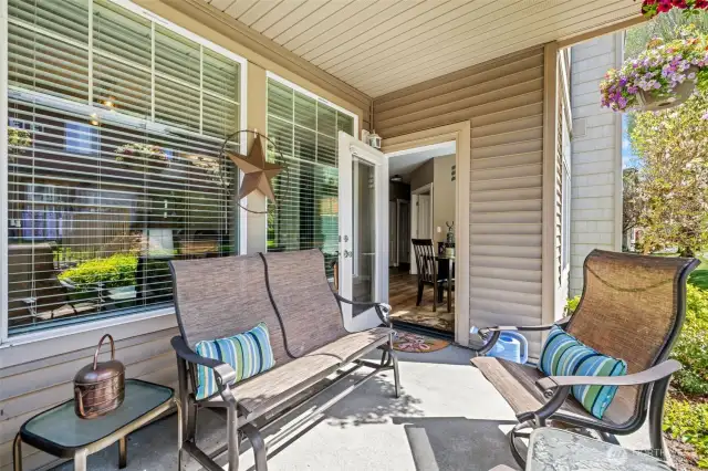 Enjoy fresh air and morning sun from your own covered patio—surrounded by greenery and just the right mix of privacy and connection to the community.
