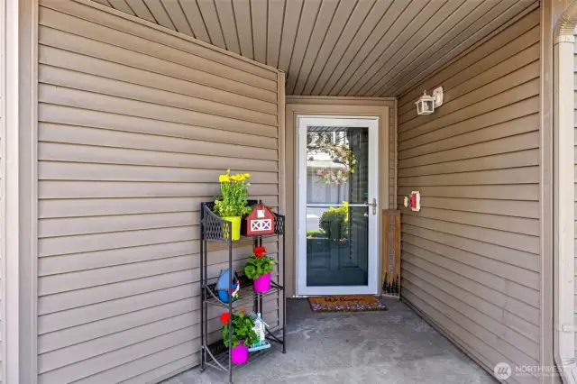 A covered front porch keeps your deliveries dry and protected—while adding charm and providing a cozy spot to greet guests or unwind for a moment.