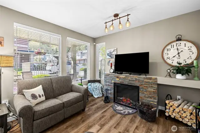 Open and airy living room with plenty of natural light—hello cozy evenings and Netflix marathons.