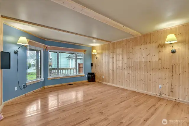 The living room features lots of wood finishes which create a warm coziness to this space.