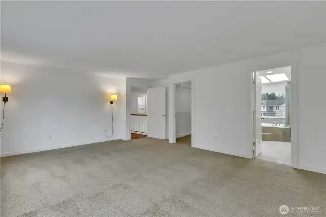 The primary suite includes a large walk-in closet and spa-like en suite.