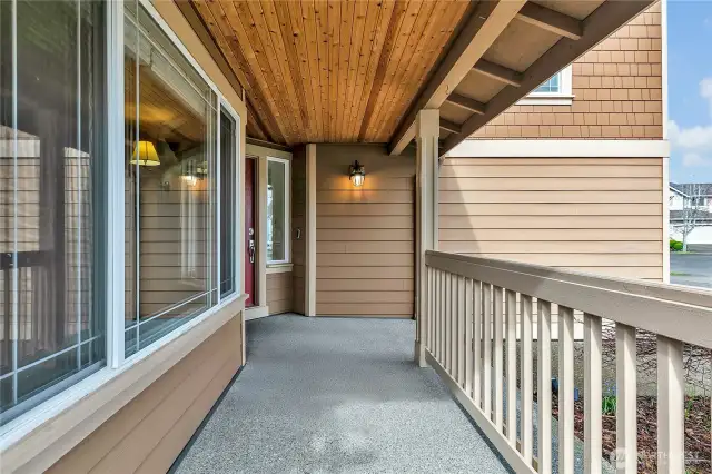 Enjoy your morning cup of coffee or evening glass of wine on your spacious covered front porch.