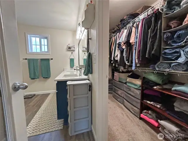 Primary walk-in closet and bathrooom