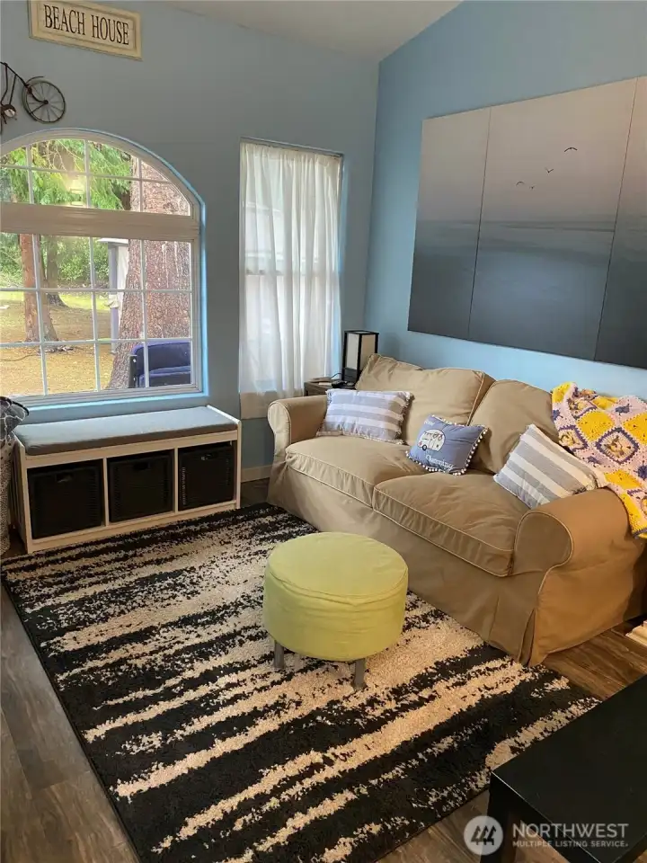 Decorative windows and lots of room for a full-sized sofa.