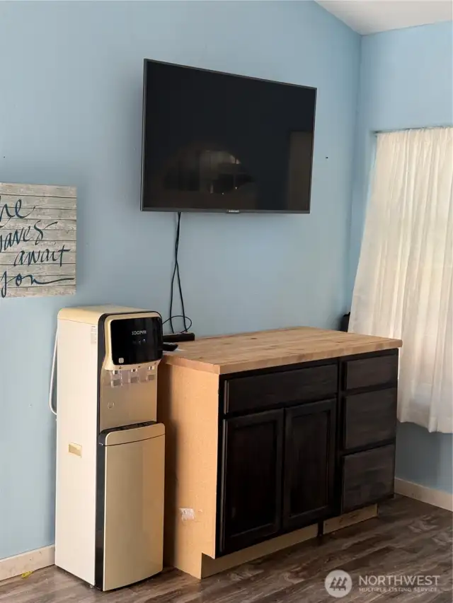 Cabinets and TV. Owners did have a refrigerator which you could easily add.
