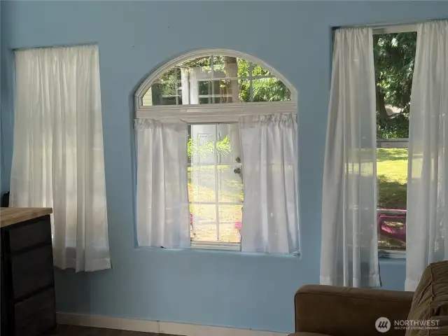 Decorative windows and lots of room for a full-sized sofa.
