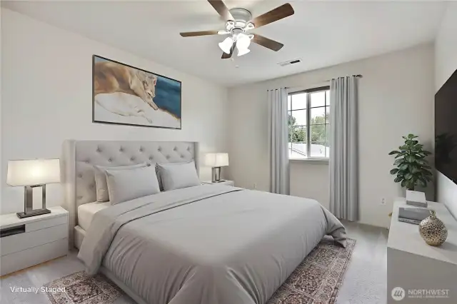 Bedroom 2 with ceiling fan.