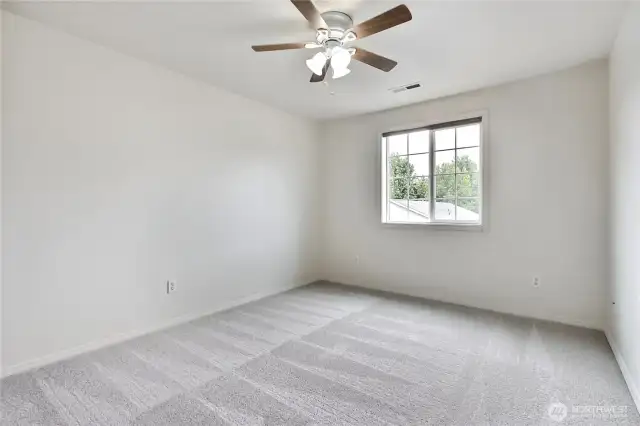 Bedroom 2 with ceiling fan.