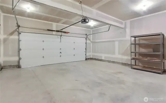 Garage has additional storage on both sides. New water heater just installed.