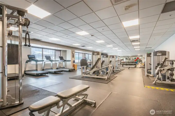 Fitness Center - West Tower, 2nd Floor - Includes: Fitness equipment, Locker room with showers and changing rooms, and complimentary towel service. Upkeep managed by Pan Pacific Hotel Management.