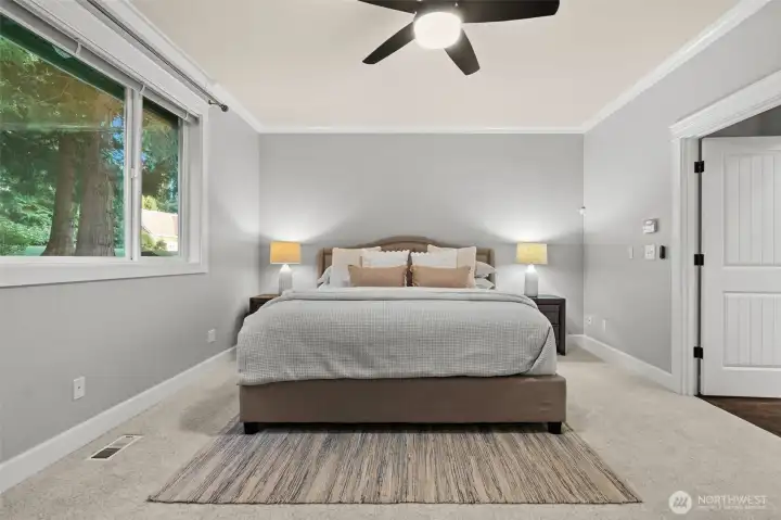 Spacious primary suite located on the main level.