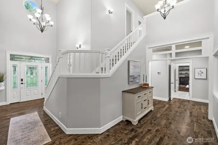 Additional bedrooms await upstairs, perfect for family or guests.