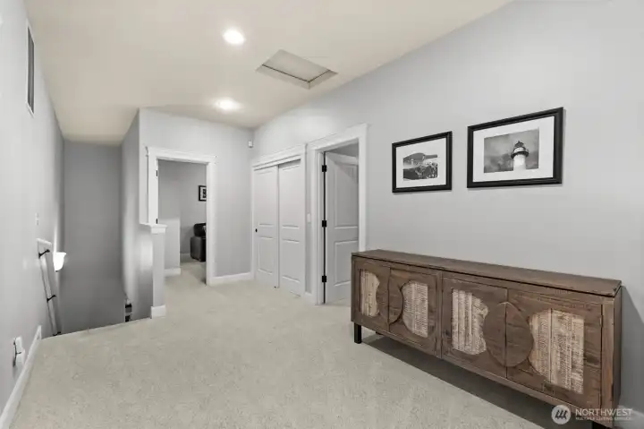 Spacious hallways enhance the home’s open layout.