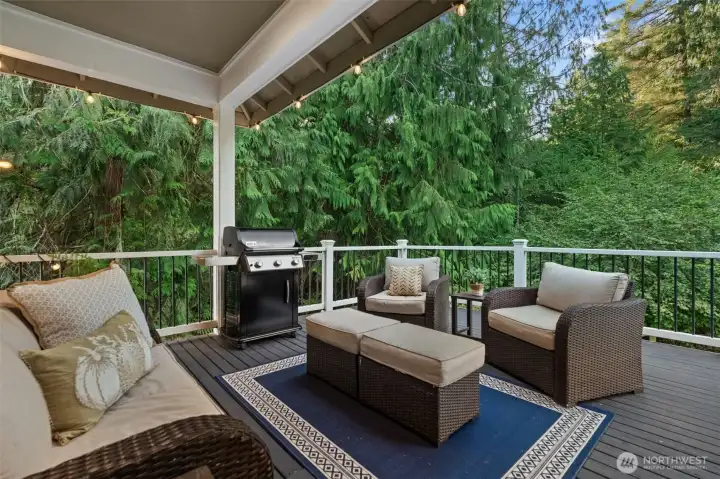 Relax on the deck with views of fall foliage and apple trees.